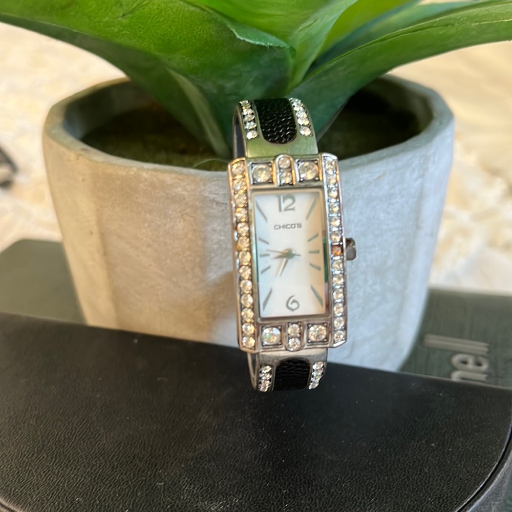 Chico’s black and gemstone watch